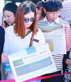 光明日报送到故宫展览现场